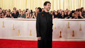 Why did Hollywood stars wear red pins to the 2024 Oscars?