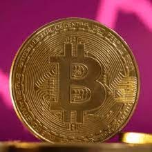 Bitcoin breaks $70,000 in volatile trading, hitting a new record to end the week