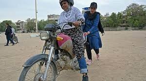 Women ‘Rowdy Riders’ take on traffic and tradition in Karachi